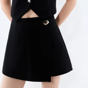 Interlock skort with gold button