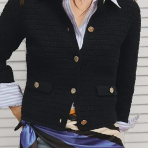 Jacket with metallic buttons
